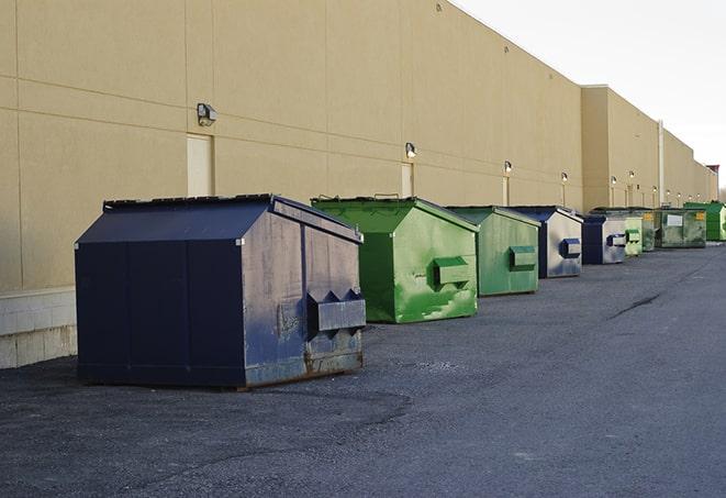 dumpsters lined up for use on busy construction site in Horseshoe Bend